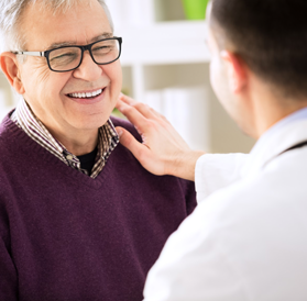 doctor speaking with male patient